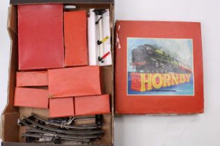 A quantity of Hornby 0 gauge clockwork rolling stock to include a No. 20 goods set plus other