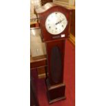 A 1930s mahogany grandmother clock, having striking and chiming movement, glazed panel trunk