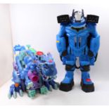 A collection of toys to inlcude plastic vinyl dinosaurs, Laser X, laser tag gift sets, a Robo