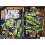 Two trays containing a quantity of Star Wars Power of the Force action figures and gift sets by