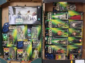 Two trays containing a quantity of Star Wars Power of the Force action figures and gift sets by