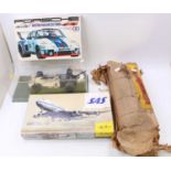 A collection of mixed media plastic and balsa wood kits to include a Heller Boeing 747 1/125 scale