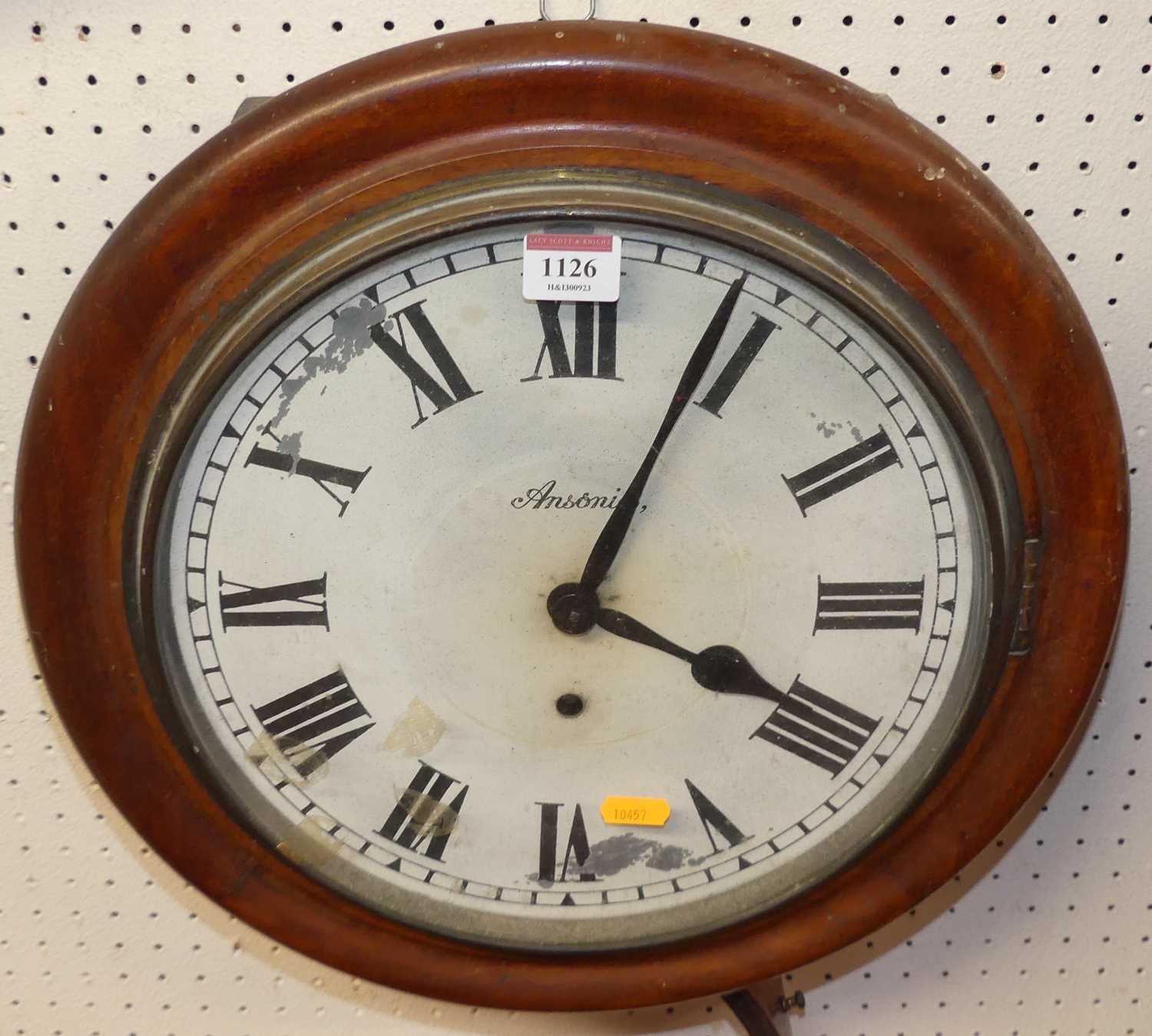 An Ansonia mahogany circular wall clock. dia. 40cm