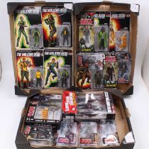 Three trays containing a quantity of Walking Dead action figures to include Skybound Exclusives,