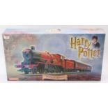 A Hornby 00 gauge Hogwarts Express electric train set, housed in the original polystyrene packed box