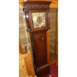 A circa 1800 provincial oak long case clock, the silvered dial signed John Livejoy, twin winding