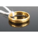 A 22ct gold wedding band, 4.3g, size N