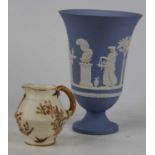 A Royal Worcester Old Ivory jug, shape No.1185; together with a Wedgwood jasperware vase, h.19cm