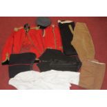 A collection of assorted military uniforms, to include Royal Artillery mess jacket with suede collar