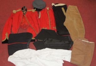 A collection of assorted military uniforms, to include Royal Artillery mess jacket with suede collar