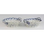 A pair of Caughley table baskets, circa 1785, of open trellis form, transfer decorated in in the