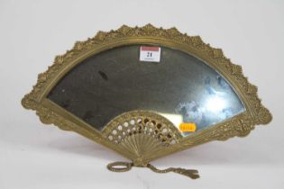 A brass easel mirror in the form of a fan, w.38cm