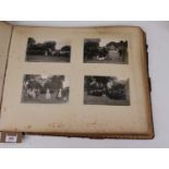 A leather bound folio 'The St Edmundsbury Pageanyt 1907', containing various real photographs and