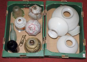 Two boxes to include a Victorian brass oil lamp and various light shades