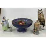 A Royal Doulton floral decorated bowl, dia.25cm; together with a Karl Ens model of an owl, h.26cm; a