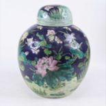 A Chinese porcelain ginger jar, of globular form, enamel decorated with flowers, h.27cm