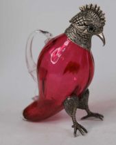 A Victorian style novelty metal mounted cranberry glass decanter in the form of a cockatoo, height