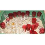 Two boxes of miscellaneous glassware to include cranberry glass beakers, cranberry glass wein hocks,