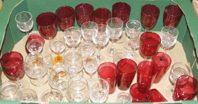 Two boxes of miscellaneous glassware to include cranberry glass beakers, cranberry glass wein hocks,