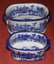 A graduated set of two blue and white transfer decorated foot baths, the largest w.45cm