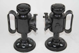 A pair of black painted carriage lamps, height 21cm