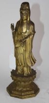 A gilt metal figure of Guanyin, h.27.5cm