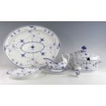 A collection of Royal Copenhagen blue half lace pattern dinnerwares, comprising a tureen, meat