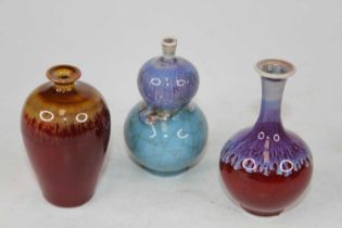 A Chinese miniature porcelain double gourd vase, height 9cm, together with two others Blue double