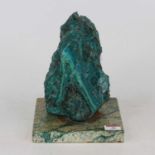 A natural chrysocolla geode, mounted on a polished square hardstone plinth, h.22cm