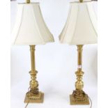 A pair of gilt table lamps with shades, each h.66cm