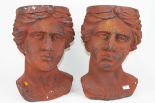 A pair of composite head and shoulder busts, h.45cm