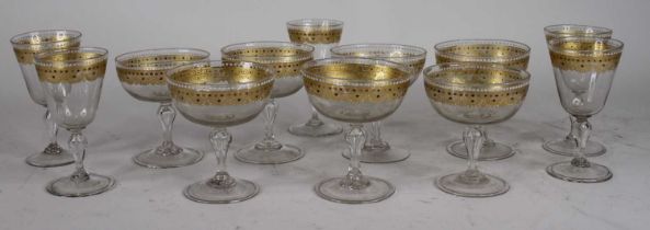 A collection of Venetian style drinking glasses, each having a gilt decorated rim