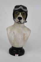 A head and shoulders bust of a dog dressed as a racing driver, h.49cm