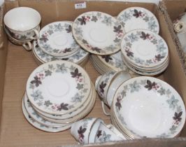 A collection of Royal Doulton dinner and tea wares in the Camelot pattern TC1016