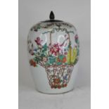 A 19th century Chinese porcelain jar and cover, enamel decorated with flowers and insects (a/f), h.