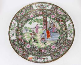 A large Chinese Canton export charger, enamel decorated in the famille vert palette, the centre