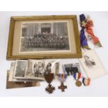 A small collection of militaria to include a WWI Croix de Geurre medal, regimental photograph,