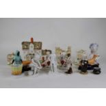 A collection of Victorian and later Staffordshire pottery, to include animal figures and