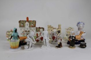 A collection of Victorian and later Staffordshire pottery, to include animal figures and