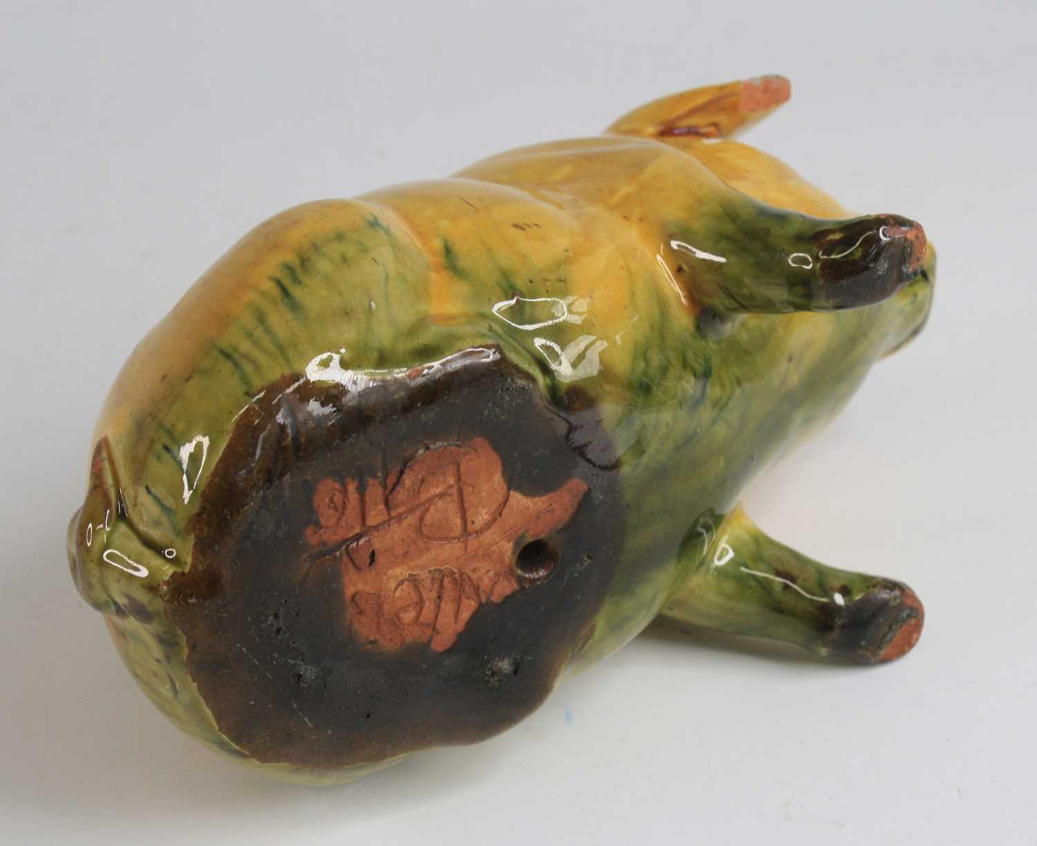 An Ewenny pottery piggy bank, shown in seated pose, having a mottled yellow and green glaze and - Image 4 of 5
