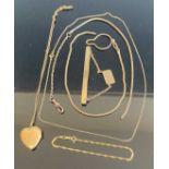 A 9ct gold finelink necklace, 1.4g; together with gilt metal and gold plated costume jewellery