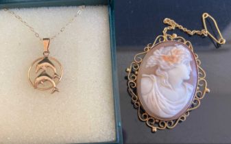 A carved shell cameo brooch in 9ct gold mount, with safety chain, 40 x 32mm; together with a 9ct