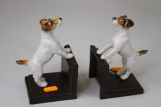 A pair of novelty cast iron bookends each in the form of a jack russell