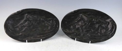 Jean Garnier (1853-1910) - a pair of Art Nouveau patinated Art Metal oval plaques, each modelled