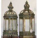 A near-pair of verdigris metal hanging lanterns, the largest h.61cm In good condition.