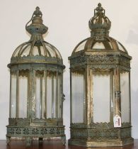 A near-pair of verdigris metal hanging lanterns, the largest h.61cm In good condition.