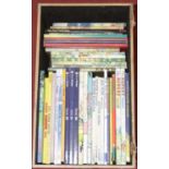 A box of assorted children's annuals, to include Rupert and Blue Peter