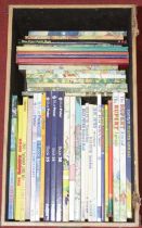 A box of assorted children's annuals, to include Rupert and Blue Peter