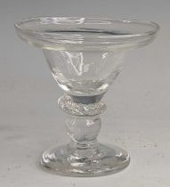 A glass sweetmeat, 18th century style, the pan topped round funnel bowl above a flattened knop and