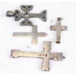 A collection of three modern silver crucifix pendants, gross 1ozt; together with a pewter example (